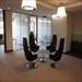 Black Glass Global Knee Tables in Breakout Area