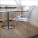 Spun Stainless Base over cast iron for glass table top stability