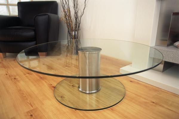 Round contemporary glass table made with stainless steel and UV bonding.