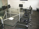 Construct Multi-Piece Boardroom Table with Stainless Steel Frame and Legs