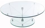 Futureglass, architectural reception or coffee table in glass and polished stainless steel rope, shown with 700mm diameter round glass top.