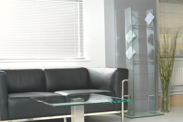 1500mm tall medium width glass media storage shown as part of our furniture for the office range including CD and DVD storage, glass shelves tables, desks and coffee tables.